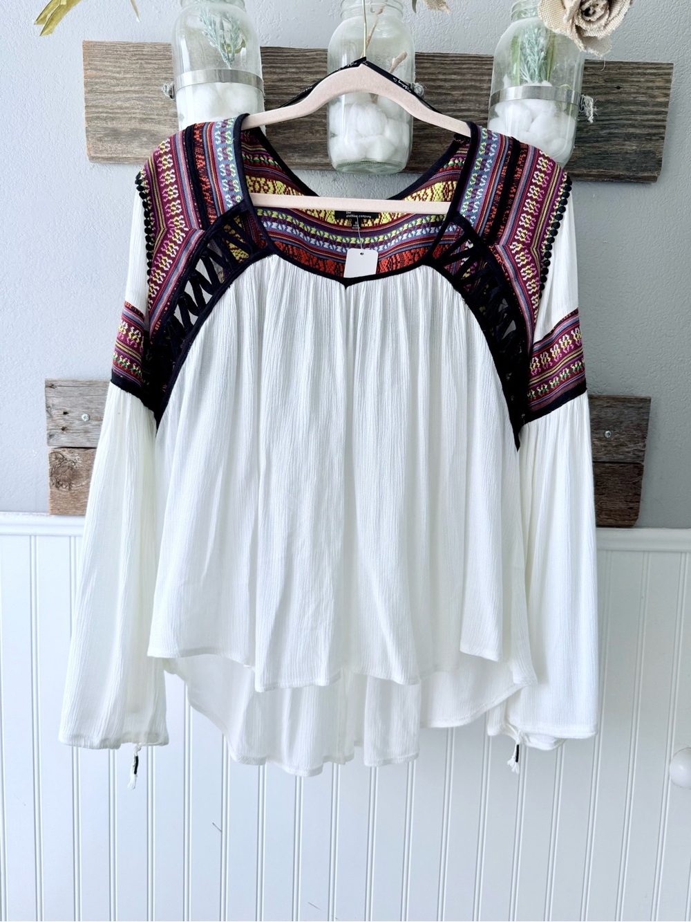 the clothing company White Peasant Blouse with Multicolor Embroidered Yoke
